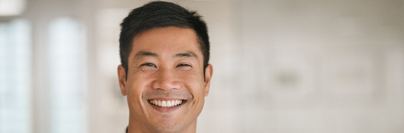 Woman pleased with her new smile after cosmetic dental bonding in Lubbock