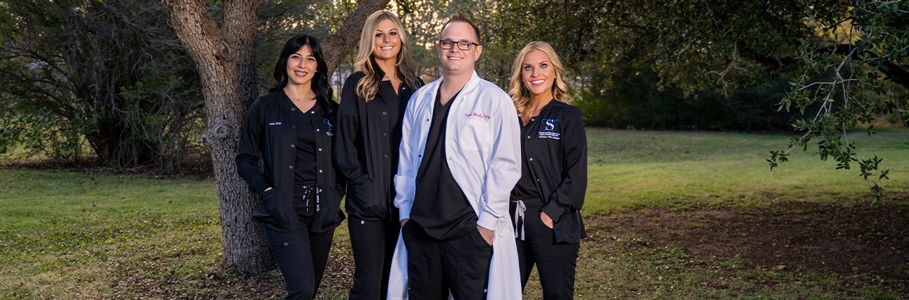 Doctor Shively and his dental team