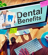 Looking at dental benefits on a computer