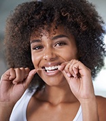 woman flossing 