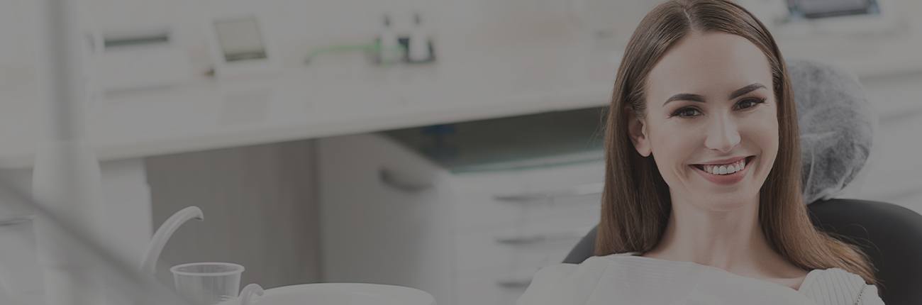 Woman smiling in dental chair