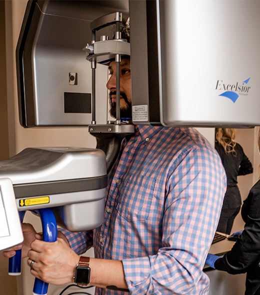 Patient receiving 3 D C T cone beam x-ray scans