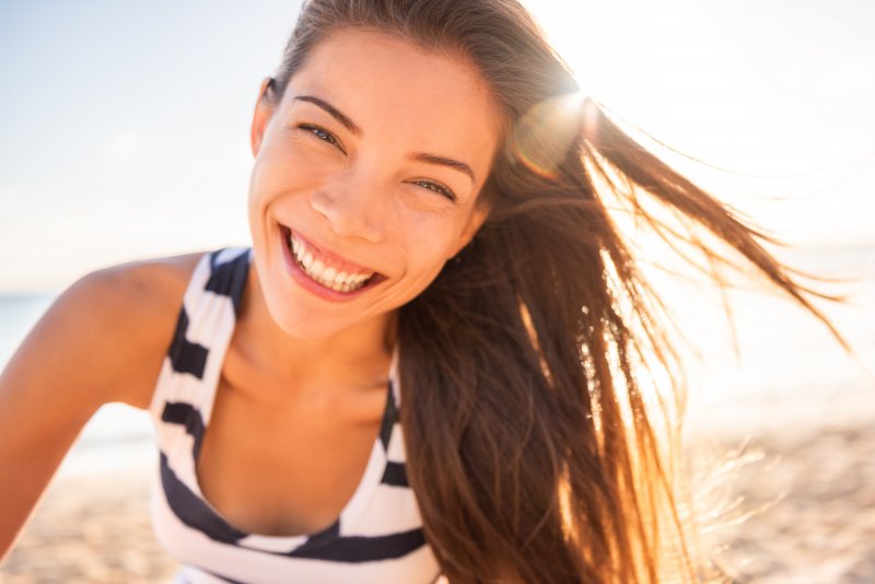 closeup of woman smiling while on vacation