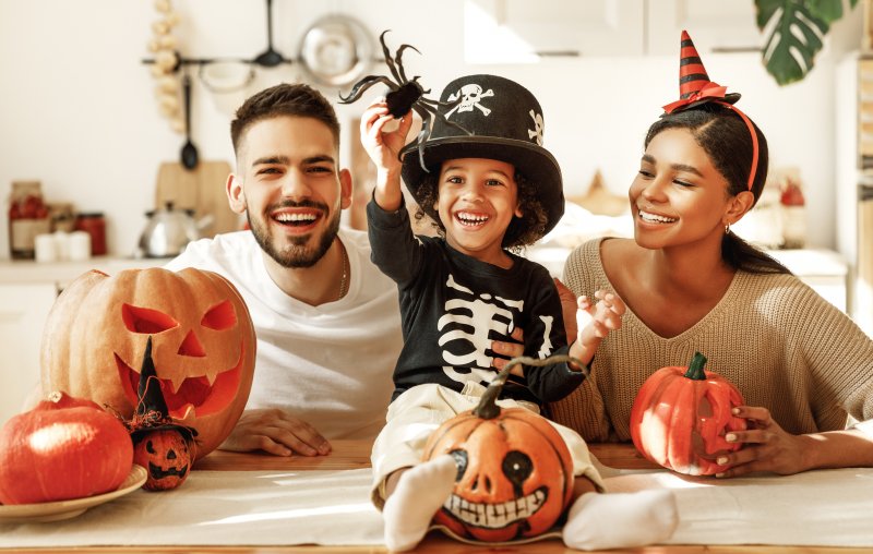 A family enjoying Halloween with good oral health