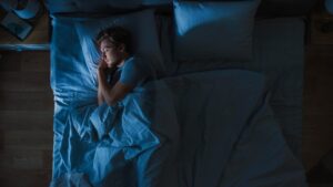 Man sleeping after finding a temporary solution for his toothache